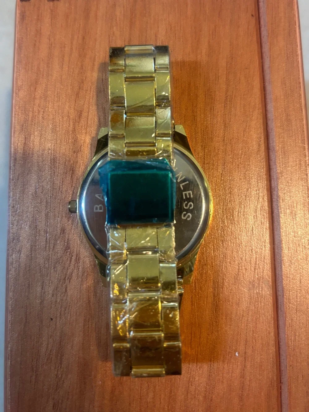 Geneva Gold Tone Watch with Black Dial